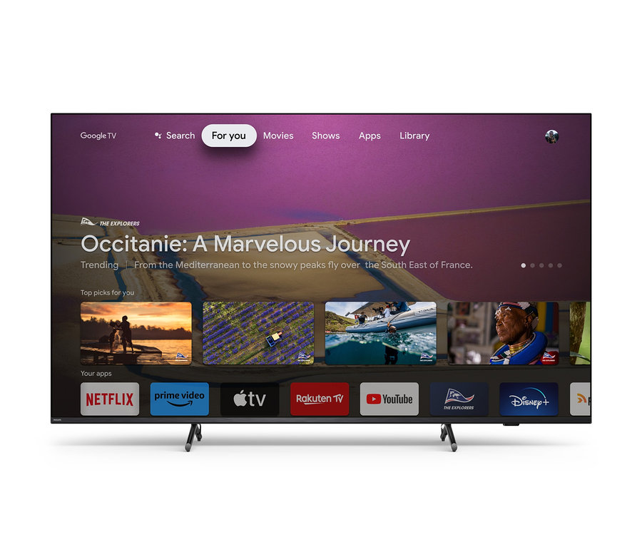 Ein Philips 4K UHD Ambilight-Fernseher mit Google TV zeigt das Menü der Streaming-Apps.
