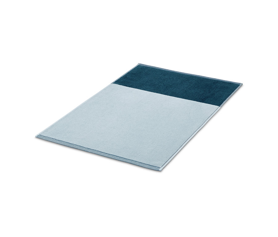 Blauer, hochwertiger Jacquard-Duschvorleger.