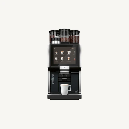 Kaffeevollautomat mit Touchscreen und einer Tasse Kaffee.