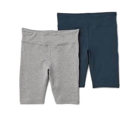 Zwei Kinder-Radler-Leggings, eine grau und eine dunkelblau.