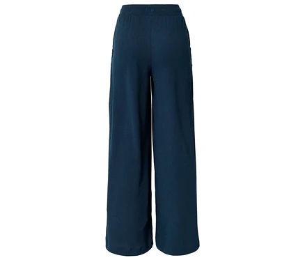 Dunkelblaue, weite Stoffhose mit elastischem Bund und Taschen, von hinten fotografiert.