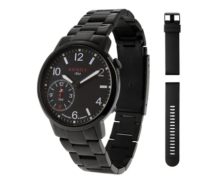 Eine schwarze Uhr mit schwarzem Metallarmband und schwarzem Zifferblatt mit weißen Ziffern, Markierungen und einem Hilfszifferblatt. Daneben sind zwei zusätzliche schwarze Kautschukarmbänder abgebildet.