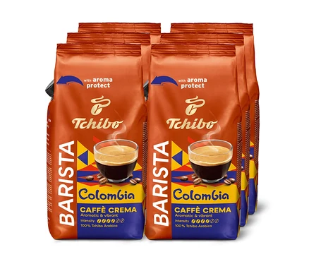 Mehrere Packungen Tchibo Barista Colombia Caffe Crema Kaffeebohnen stehen aufgereiht.