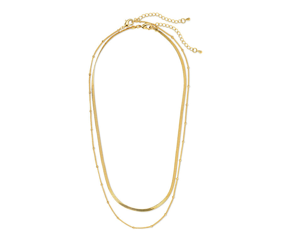 Zwei goldene Layer-Ketten: Herringbone- und Kugelkette.