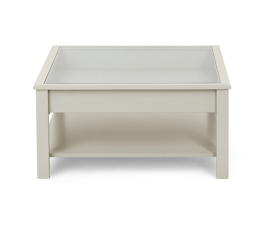 Ein Couchtisch mit Glasplatte.