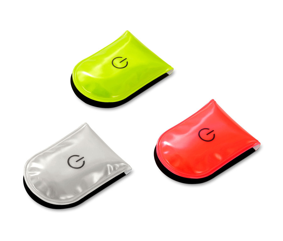 Drei LED-Magnetlichter in Grün, Silber und Rot.