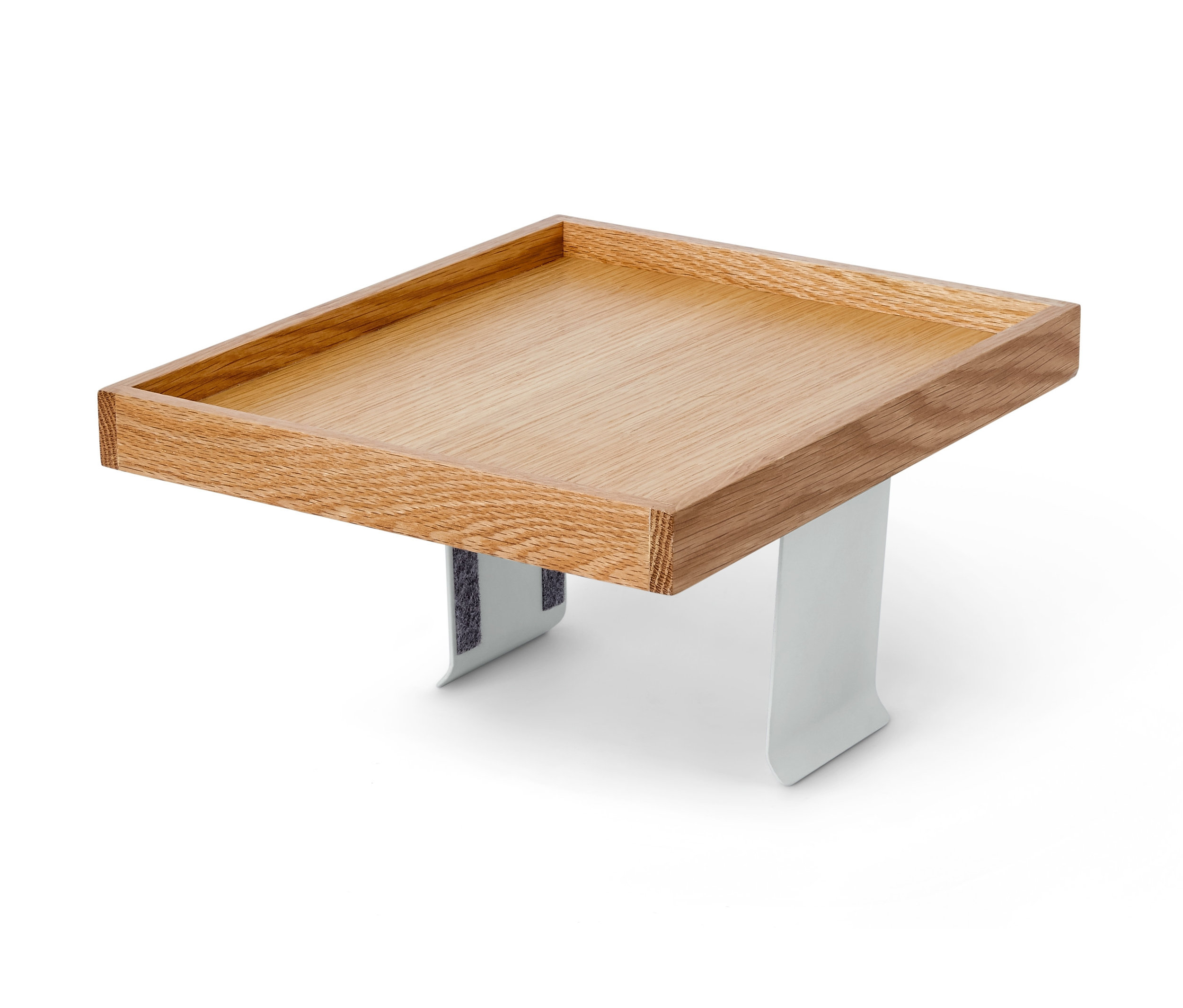 Rechteckiges Sofatablett aus braunem Holz mit weißen Metallbeinen.