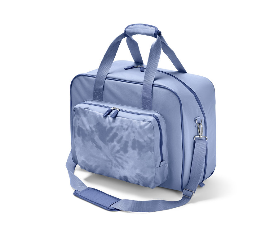 Eine blaue Nähmaschinentasche mit einer Tasche.