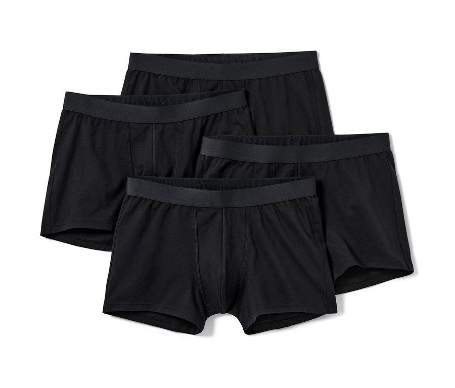 Vier schwarze Slipboxer.