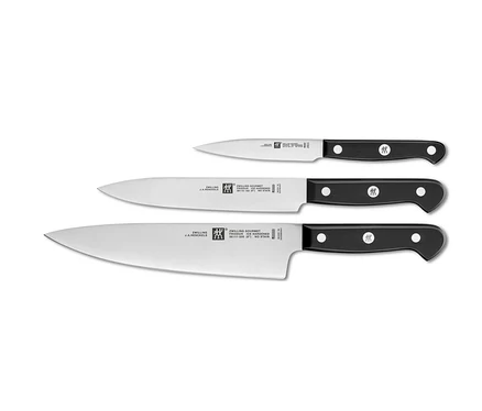 Drei ZWILLING Gourmet-Messer mit schwarzen Griffen, angeordnet von klein nach gross.