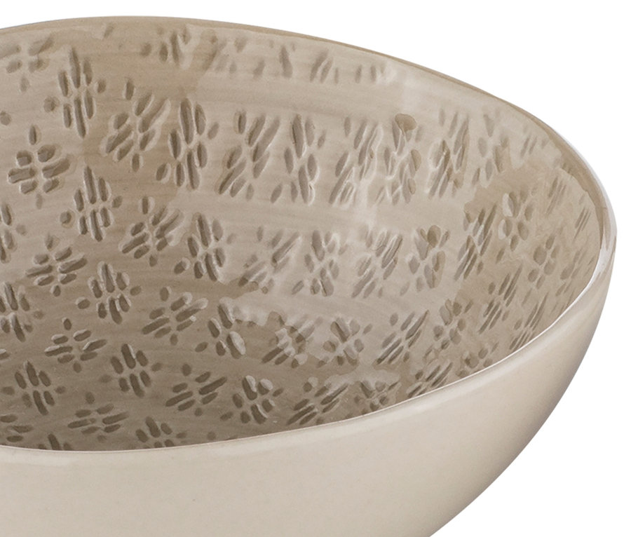 Nahaufnahme einer der drei beigen »Tirari« Schälchen mit Reliefmuster innen.