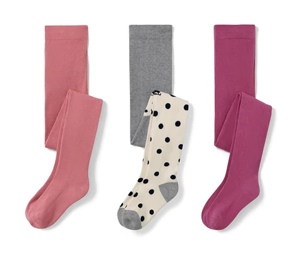 Drei Kinder-Strumpfhosen in Rosa, Grau und Beere.