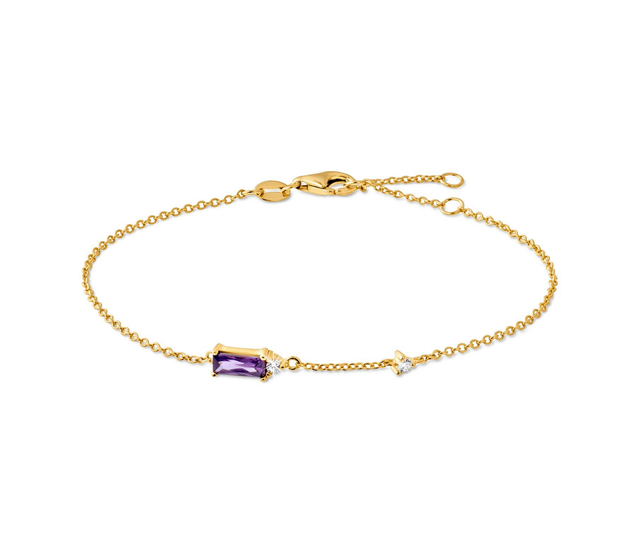 Goldenes Armband mit lila und klarem Stein in der Mitte.
