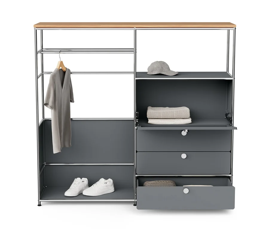 Graue Kommode Metall »CN3« mit Holzplatte, 1 Kleiderstange, 1 Klappenfach und 3 Schubladen. Innen liegen Kleidungsstücke, Schuhe und eine Mütze.