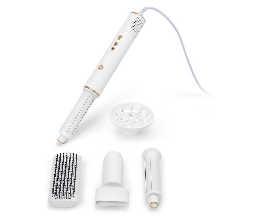 Ein weißes Multifunktions-Haarstylinggerät mit verschiedenen Aufsätzen auf einem weißen Hintergrund.