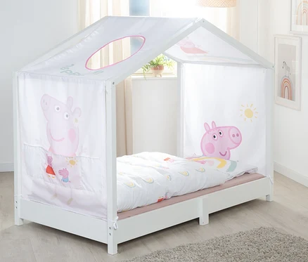 Weißes Kinderbett mit Peppa Pig Motiven und einem weißen Baldachin.