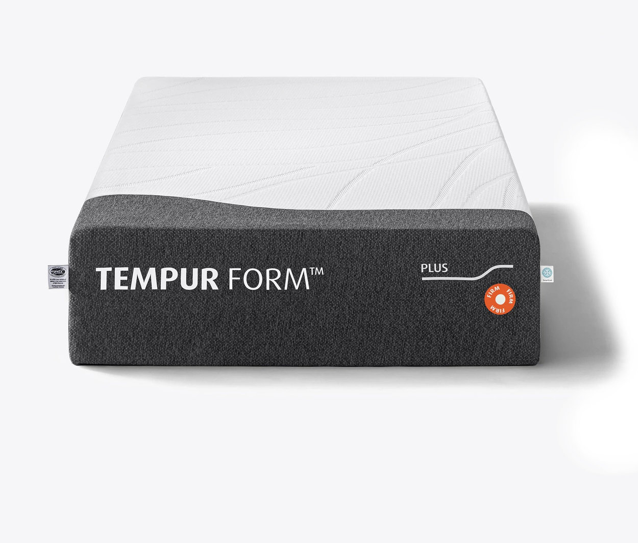 Eine Tempur Form™ Plus Matratze, fest, mit einer weißen Oberfläche und grauen Seiten.