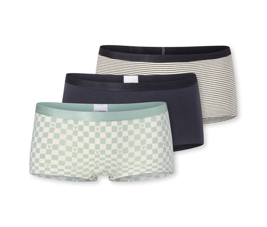 3 SCHIESSER Mädchen-Shorts: Ein Set aus drei Shorts. Eine mintgrün-weiß kariert mit Herzen, eine dunkelblau und eine cremefarben mit schwarzen Streifen.