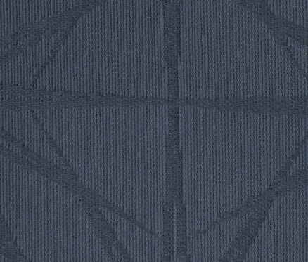 Nahaufnahme einer Jacquard-Tischdecke mit geometrischem Muster.