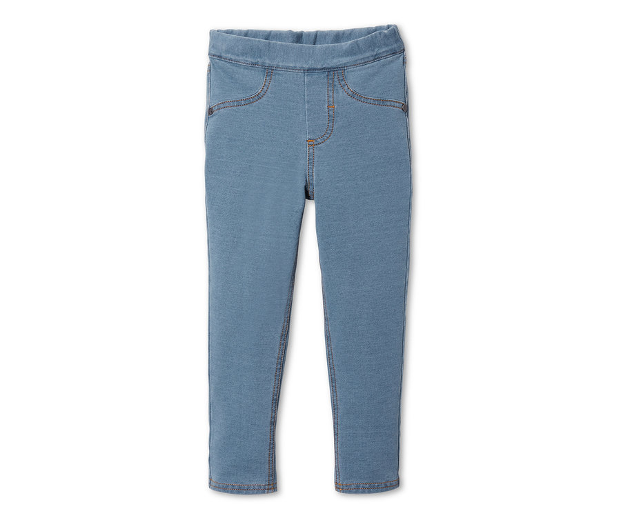 Blaue Treggings auf weißem Hintergrund.