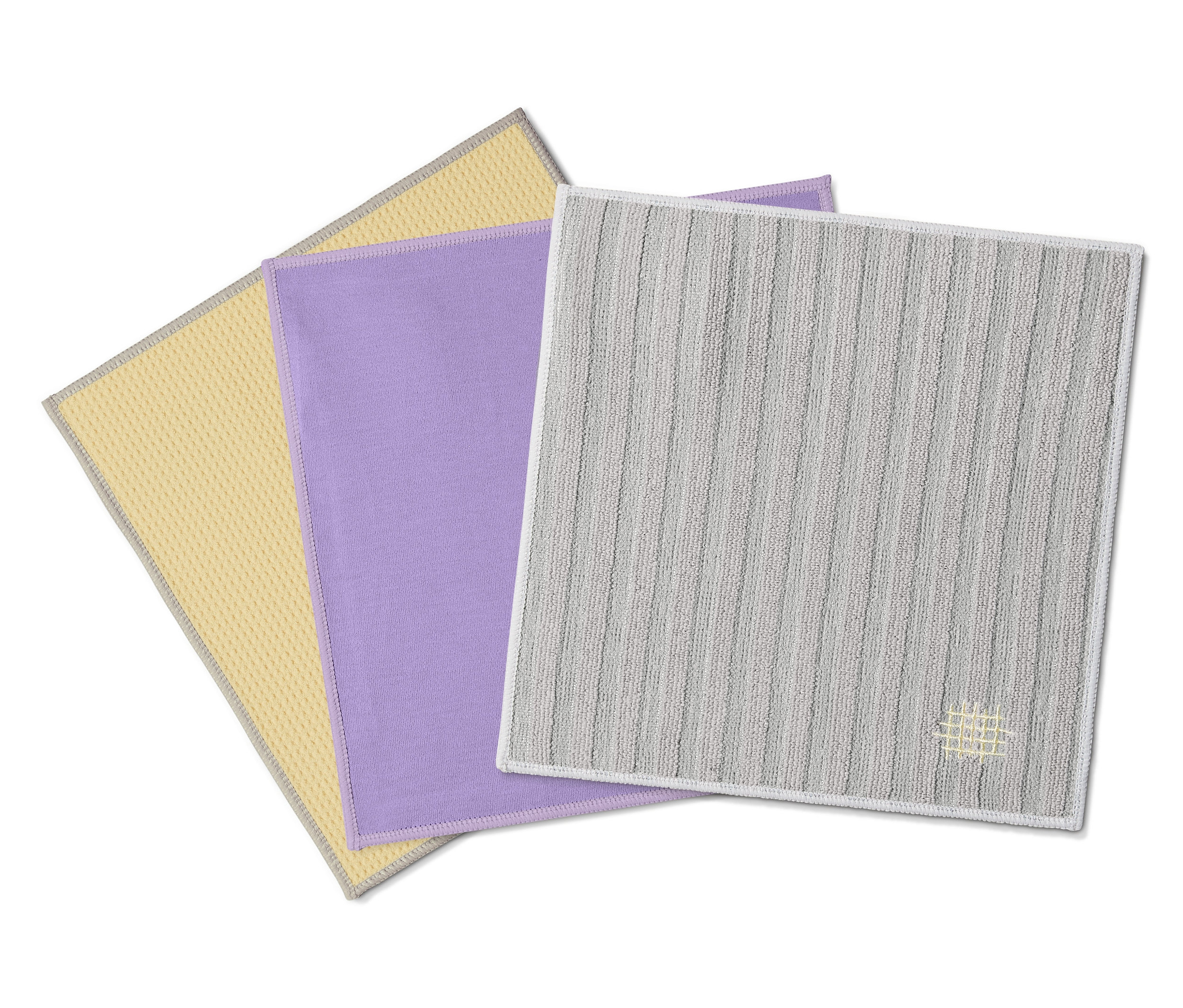 Gelbe, lila und graue 3 Spezial-Reinigungstücher liegen übereinander.