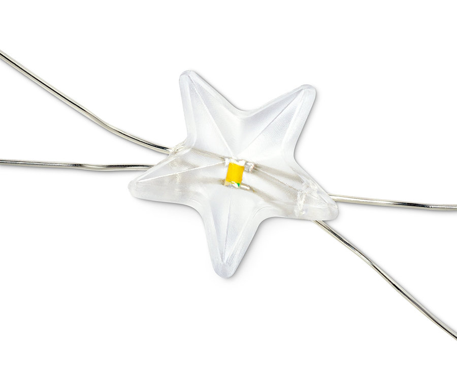Nahaufnahme einer LED-Micro-Lichterkette »Sterne«, ein durchsichtiger Stern mit LED in der Mitte.