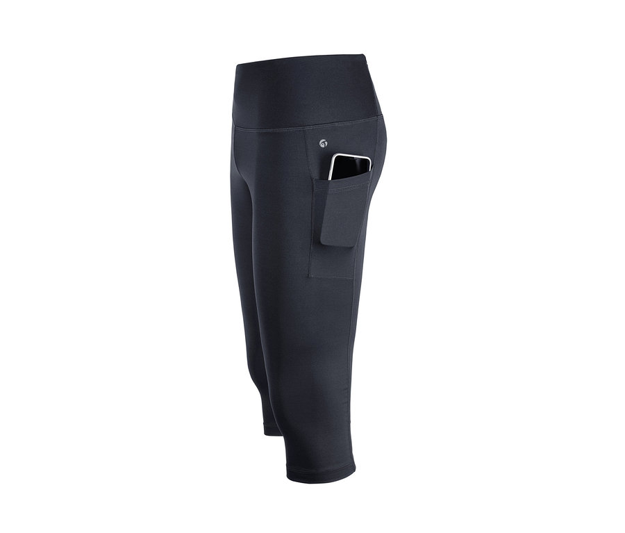 Detailaufnahme einer 3/4-Sporttight mit Handytasche, in der sich ein Handy befindet.