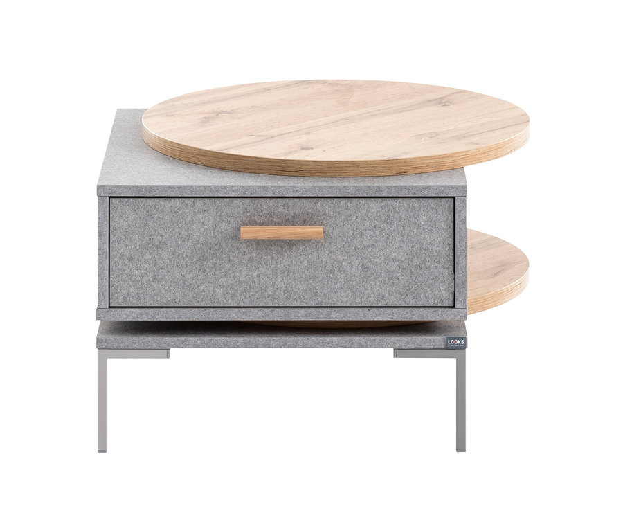 Grauer Couchtisch mit Holzelementen. Der LOOKS by Wolfgang Joop Couchtisch ist grau.