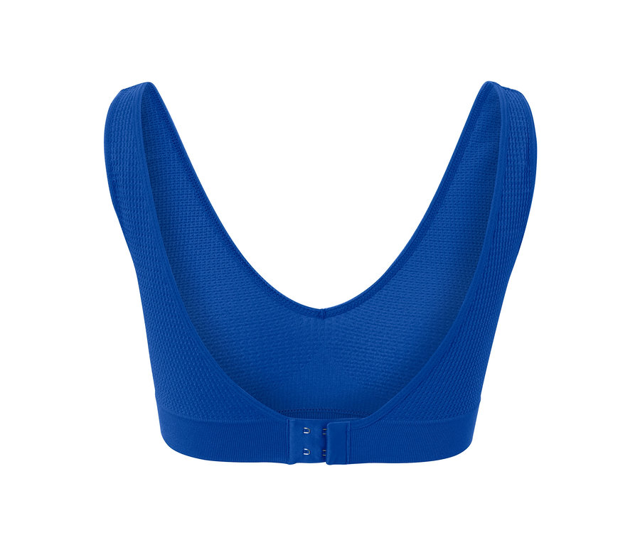 Detailansicht des blauen Seamless-BHs mit Struktur.