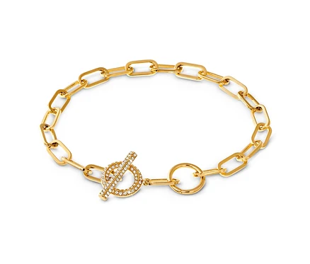 Goldenes Armband Toggle mit Kristallbesatz auf weißem Hintergrund.