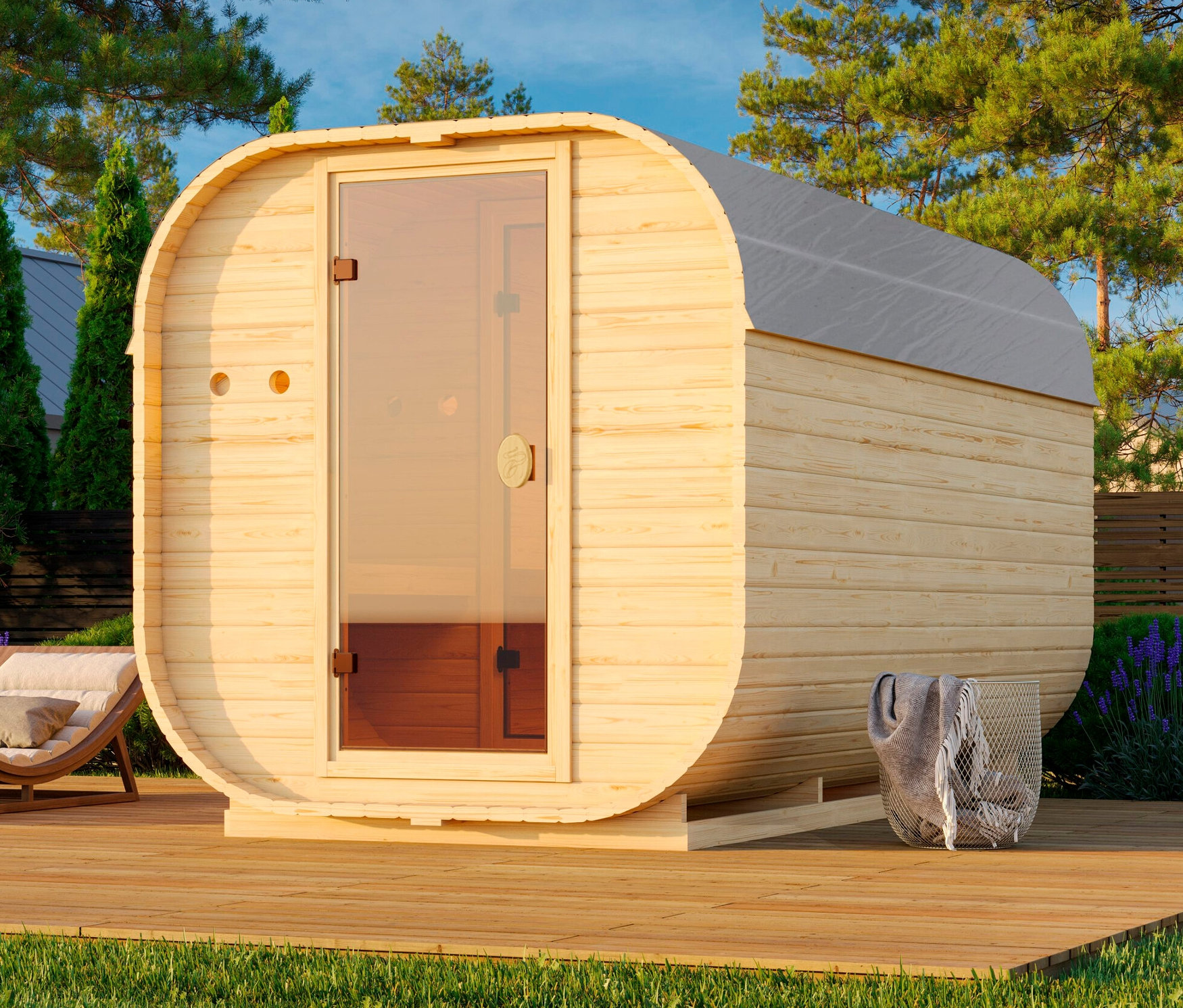 Karibu Fasssauna »Frieda 3« steht im Außenbereich auf einer Holzterrasse.