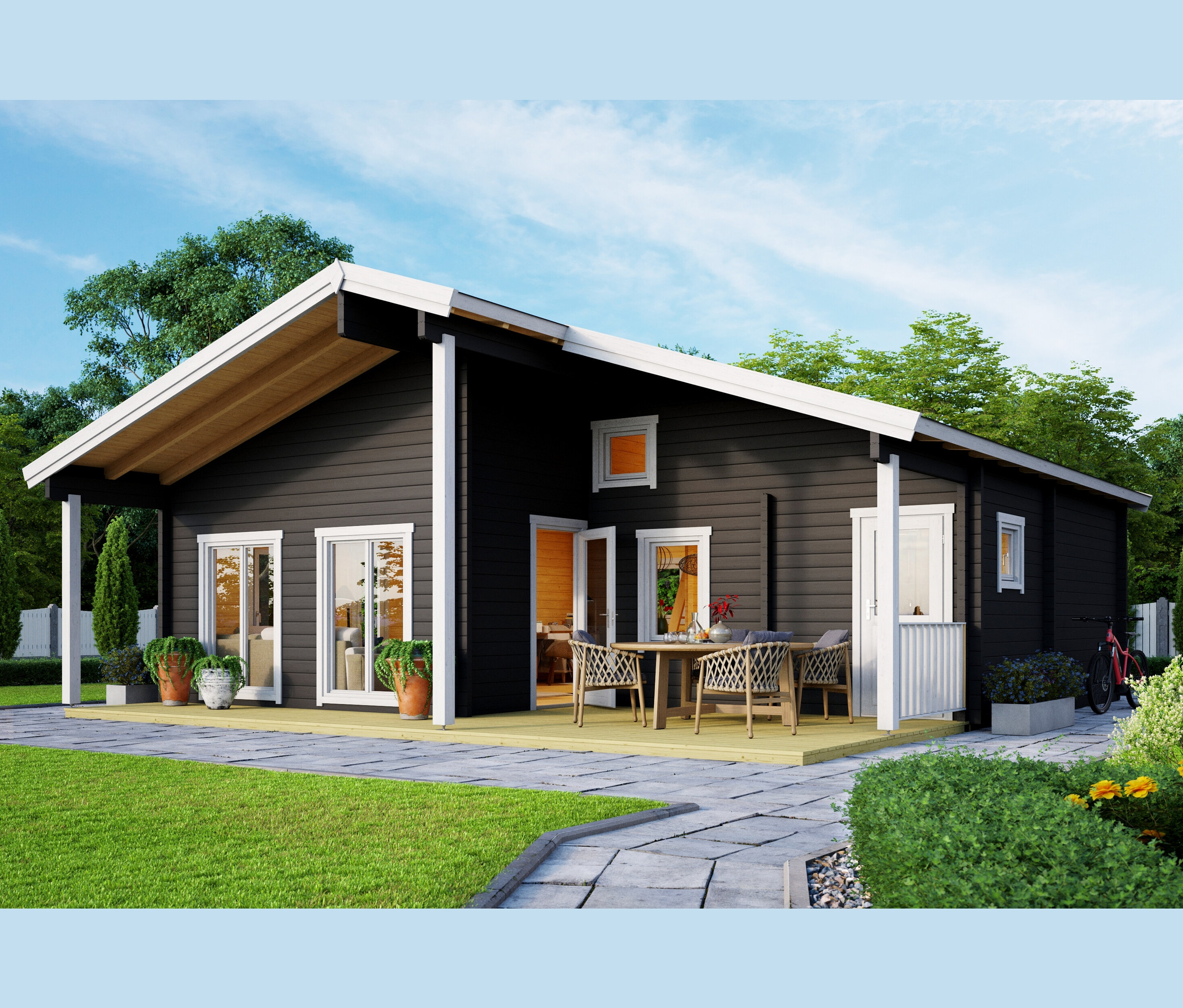 Schwarzes zweistöckiges Weka Wochenendhaus mit Terrasse und Garten.