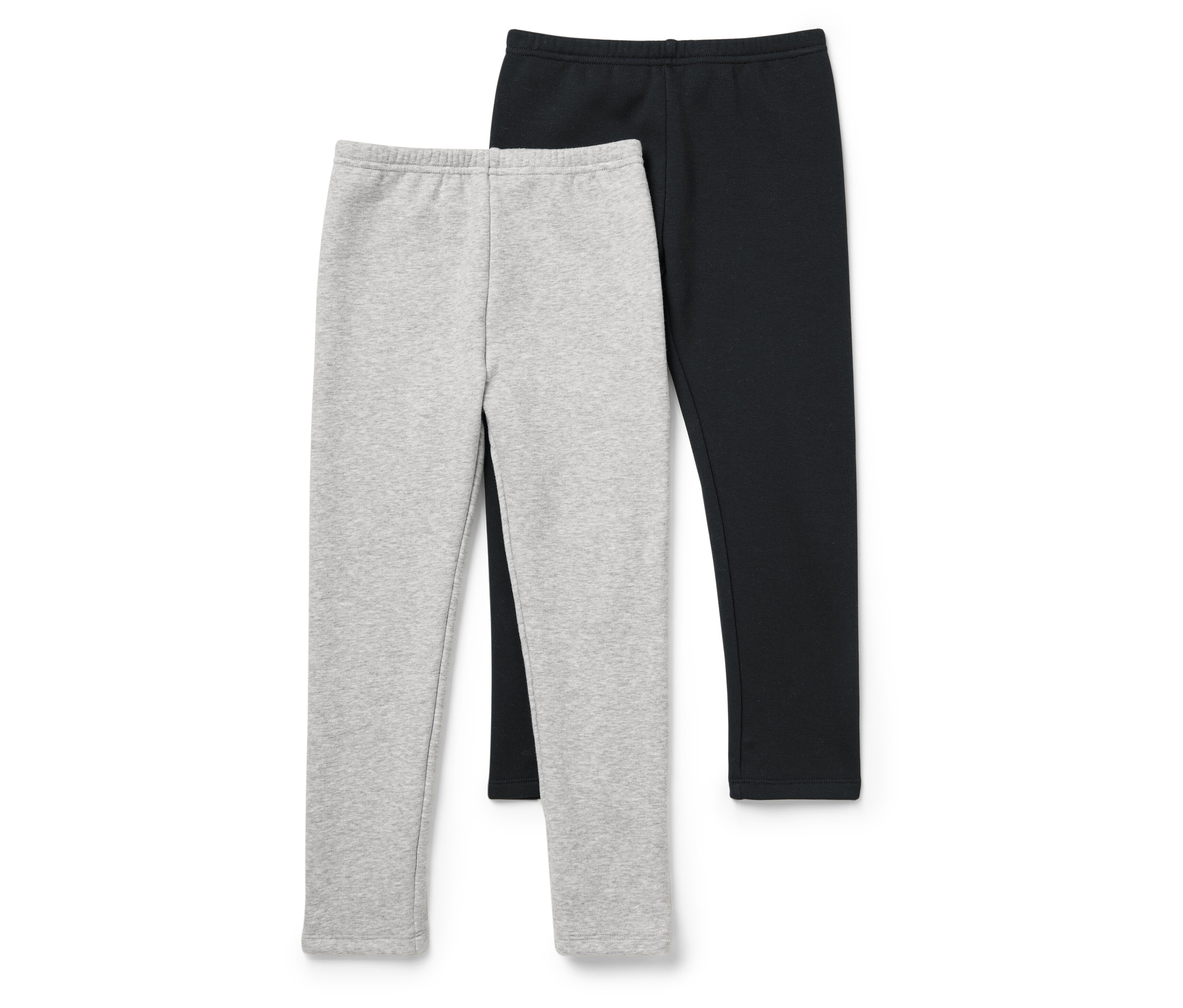 Zwei Leggings, eine graue und eine schwarze, liegen nebeneinander auf einem weißen Hintergrund.