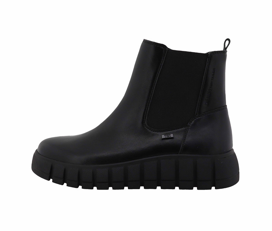 Schwarzer Leder-Chelsea-Boot mit elastischen Seiteneinsätzen und klobiger Sohle.