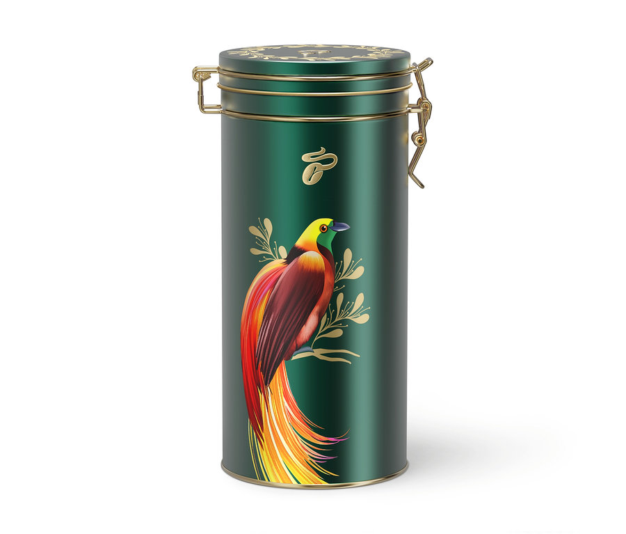 Eine grüne Kaffeedose mit goldenen Akzenten und einem bunten Vogelbild.