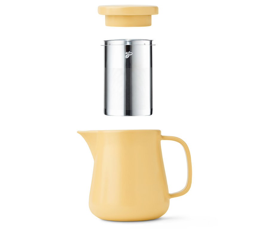 Gelber Kaffeebereiter Keramik mit Filter und Deckel.