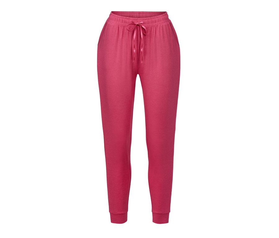 Eine rosafarbene Relaxhose mit Kordelzug in der Taille.