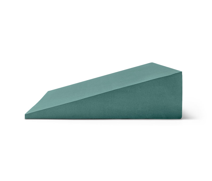 Ein Yoga-Wedge ist abgebildet.