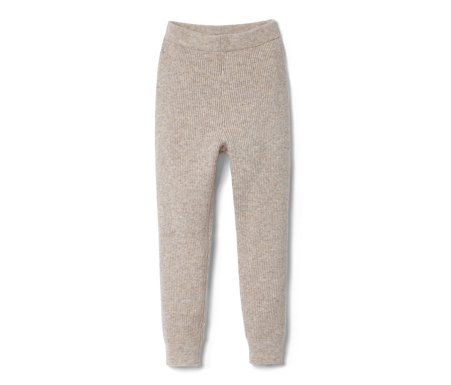 Eine gerippte Hose mit RWS-Wolle liegt auf einem weißen Hintergrund.