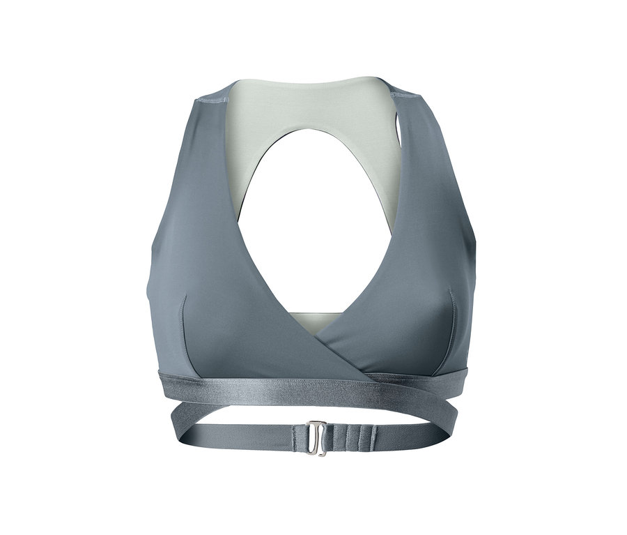 Graues Sport-Bustier mit gekreuzten Trägern und Verschluss.