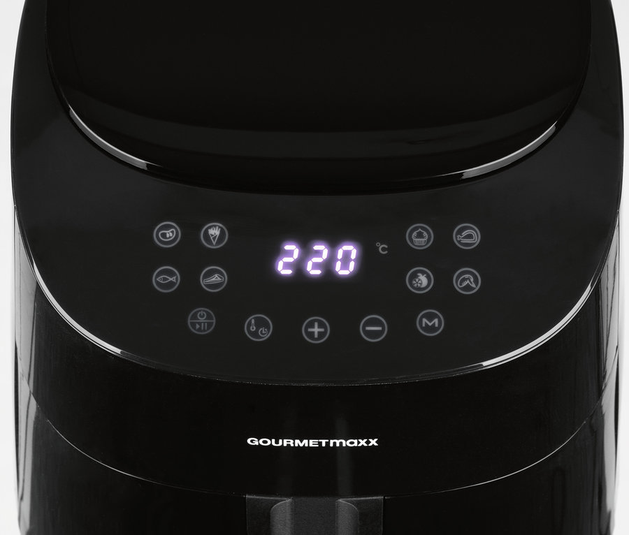 Detailaufnahme des Bedienfelds einer schwarzen, digitalen Heißluftfritteuse, das 220 °C anzeigt.