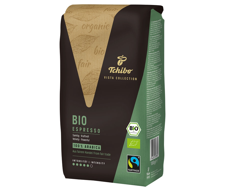 Eine Packung Vista Collection Bio Espresso - 1x 1 kg Ganze Bohne. Die Packung ist braun und hat Aufschriften in Grün und Beige. Auf der Packung befinden sich Bio- und Fairtrade-Logos.