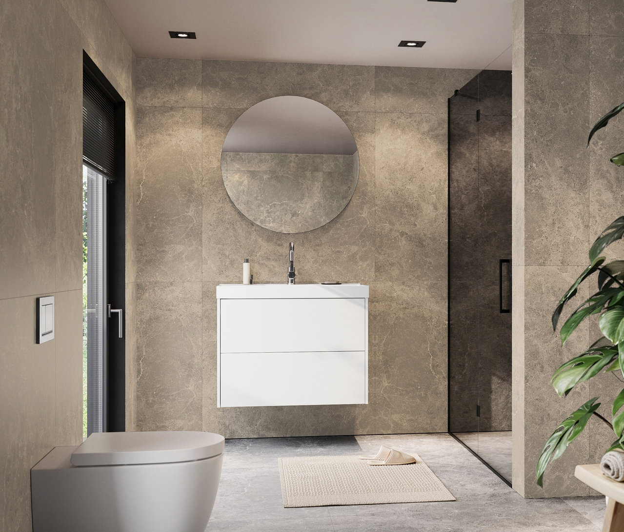 Badezimmer mit weißem Waschbeckenunterschrank, rundem Spiegel und Toilette.