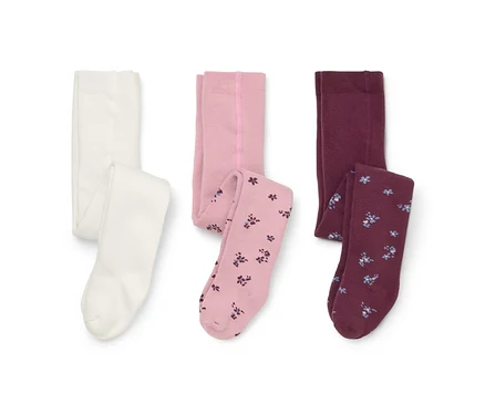 Drei Paar Strumpfhosen auf weißem Hintergrund: eine weiße, eine hellrosa mit floral gemusterten Beinen und eine bordeauxrote mit floral gemusterten Beinen.