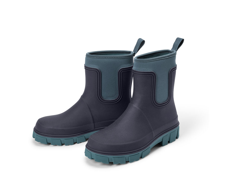 Zwei dunkelblaue Gummistiefel mit türkisen Akzenten an Schaft und Sohle, mit Zugschlaufen.
