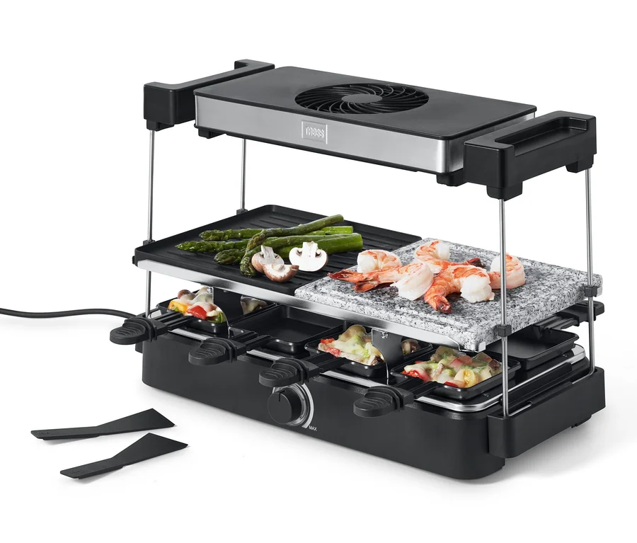 Trebs Raclette mit Dunstabzug und Steinplatte mit Garnelen, Spargel und Champignons.