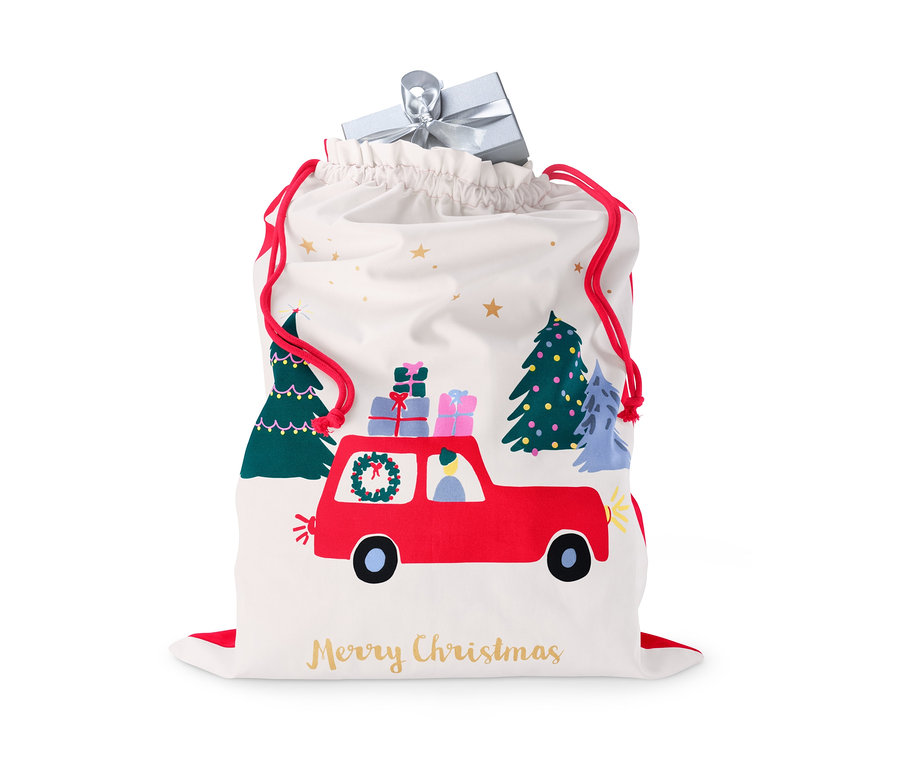 Weißer Geschenksack mit roter Autozeichnung, Weihnachtsbäumen und der Aufschrift Frohe Weihnachten.