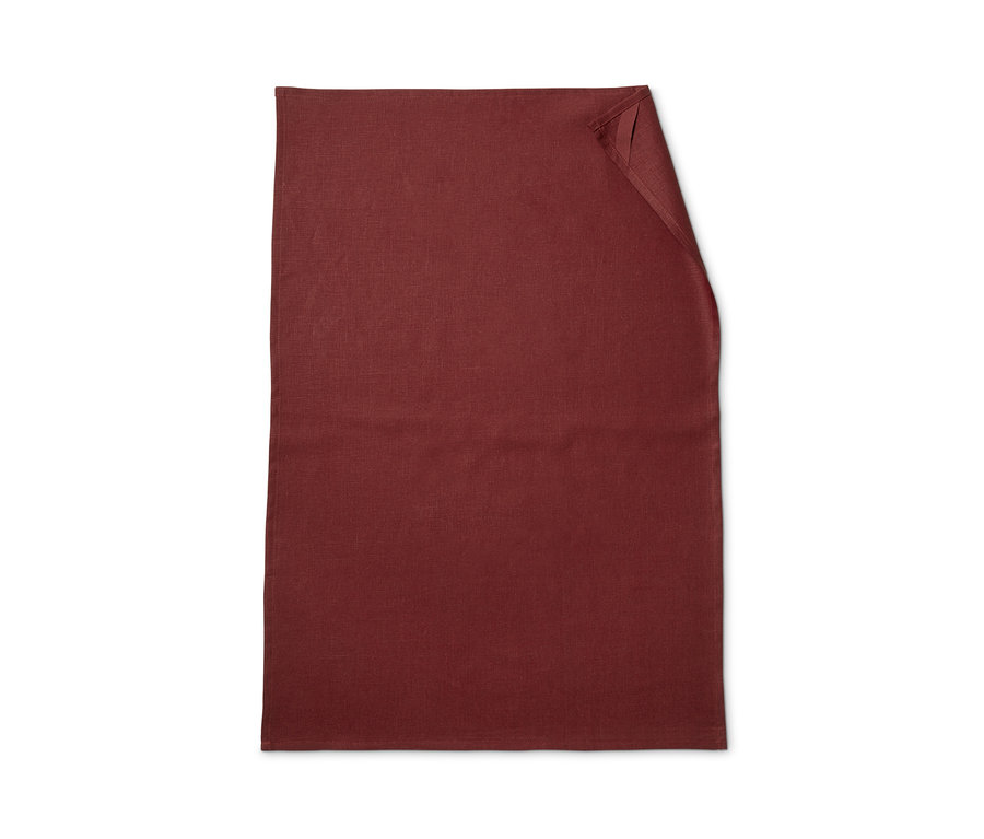 Ein weinrotes Geschirrtuch.