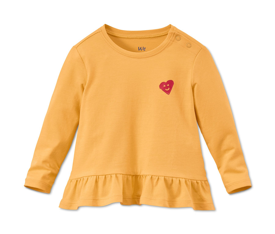 Gelbes Langarmshirt aus Bio-Baumwolle mit Rüschen.