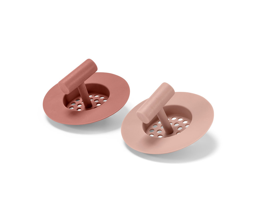 Zwei Abflusssiebe aus Silikon.